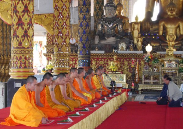 Monks preparing to chant