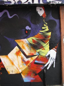 Mural of Ribbon Woman Coming Out of a Box