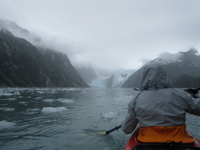 Kayaking through icebergs