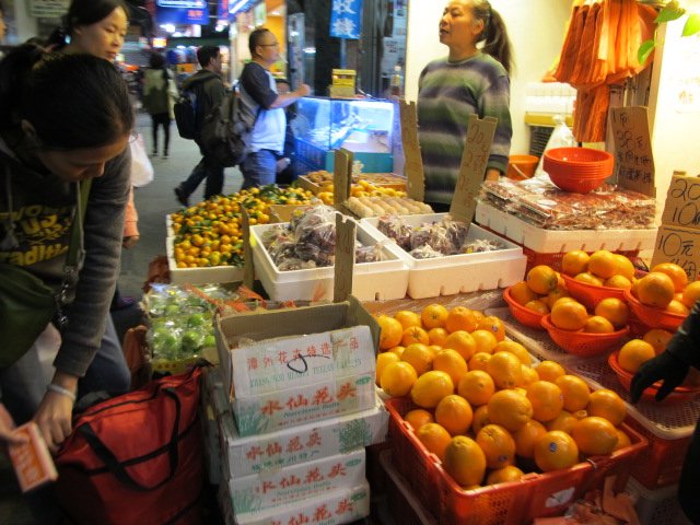 Fruits sold next to the street snacks