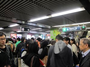 Crowds of people in the MTR station