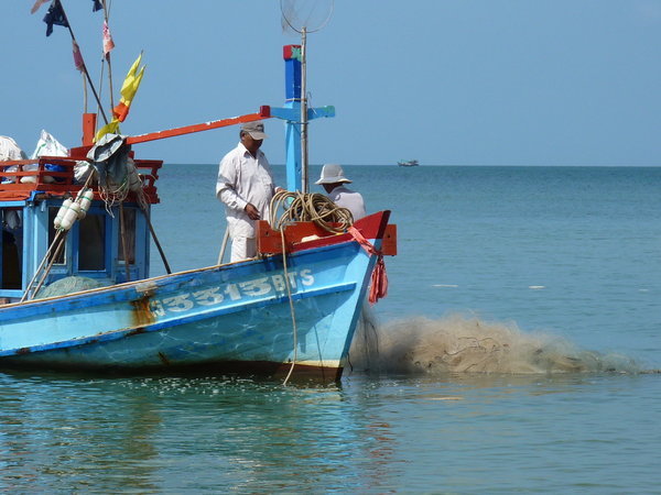 Fishermen pulling in their net...