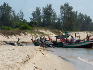 Family with their fishing boats