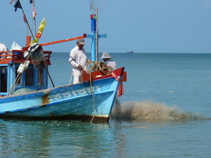 Fishermen pulling in their net...