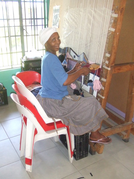 Woman making the rugs