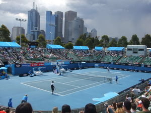 Tennis grounds with Melbourne in the background