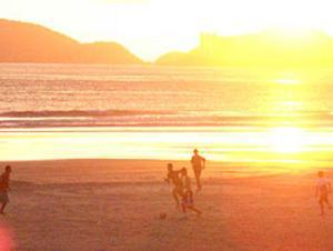 football players on the beach in Guaruja (South Brasil)