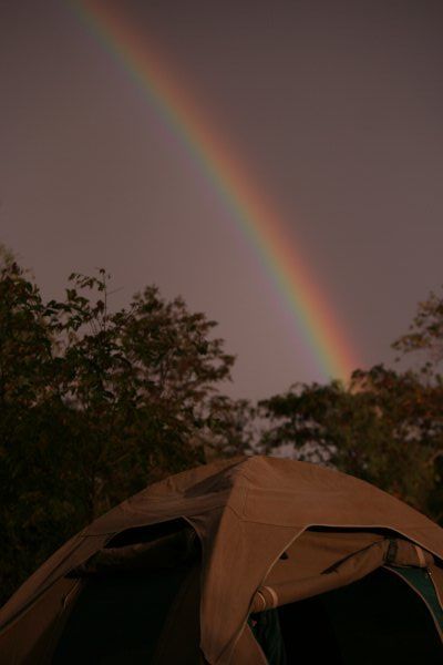 A rainbow over the tent before a huge thunderstorm