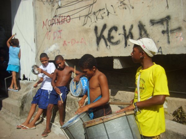 Kids drumming in the Favela