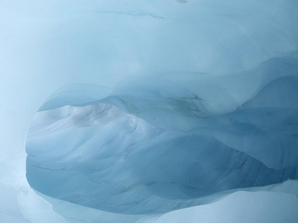 Blue cave in the glacier