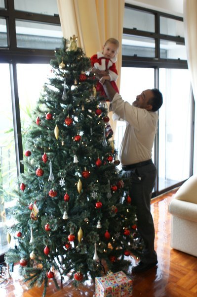 Ralte plucking an angel from the Christmas tree