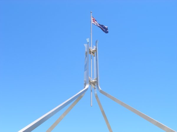Australian flag flying above New Parliment House