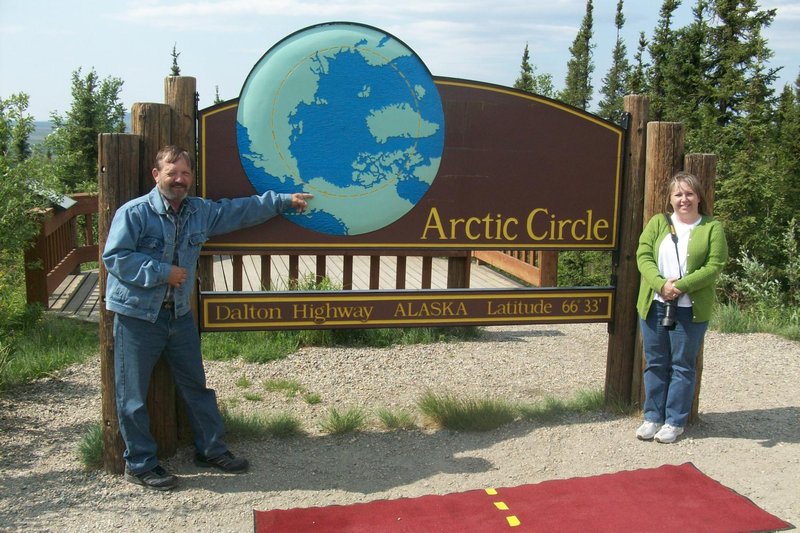 Dad and Michele crossing the arctic cirlce