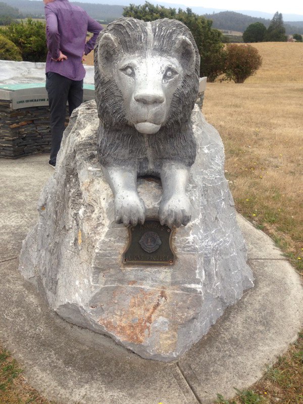 The Lions Club statue along with Rotary badge 