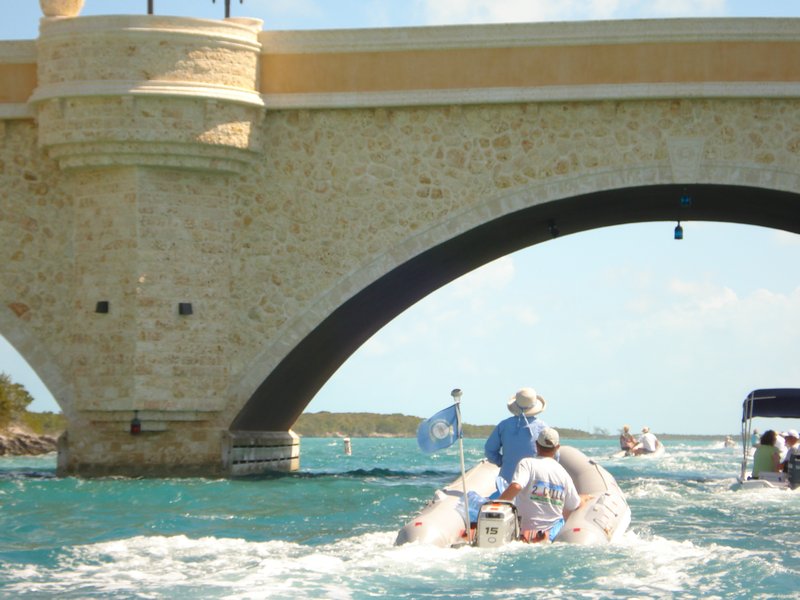 Dinghies Going Under Crab Cay Bridge