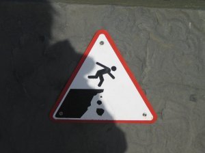 The signs warning people not to fall over the cliffs