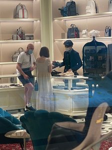 old white dude in the new Gucci store doing some shopping he doesn't want to do