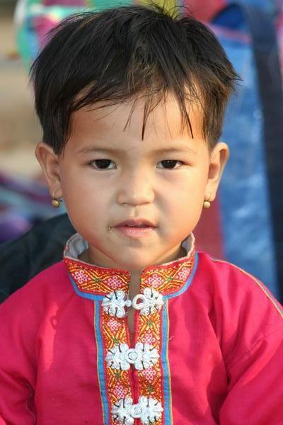 Tradional Lao Child in the Market 