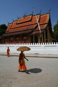 Monk in front of temple
