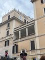 Who lives across from The Vatican Museums?