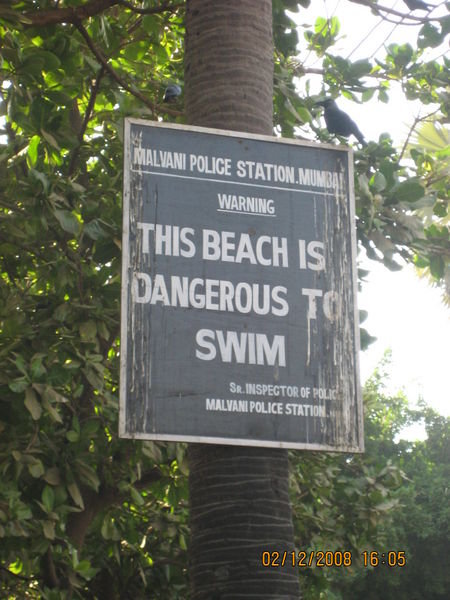 Aksa Beach sign
