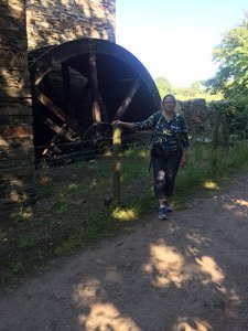 Sue by old water wheel