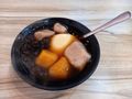 My tofu pudding with taro balls and black tapioca pearls ($60) in Jiufen