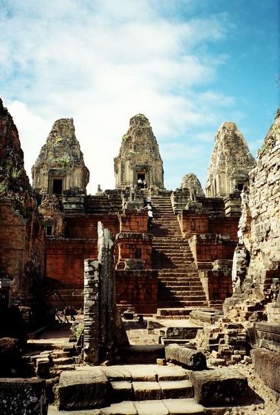 Climbing up Angkor temple