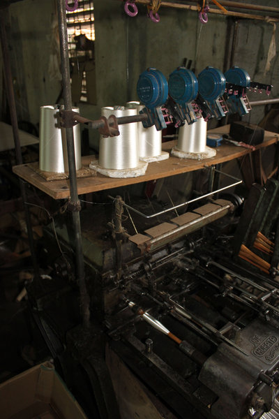 Weaving machine at a house in the village
