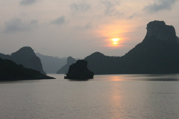 Sunset over Hạ Long bay