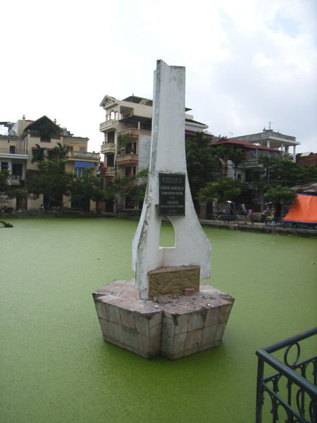 The monument on Hữu Tiệp lake
