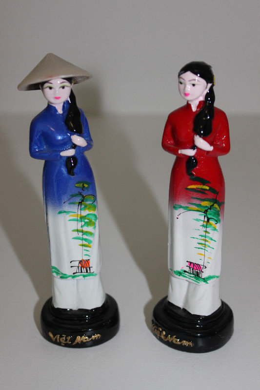 Ceramic dolls wearing traditional dresses