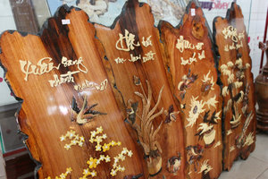 Four season wood painting in Đồng Xoài town