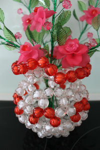 Flower vase made from plastic pieces 