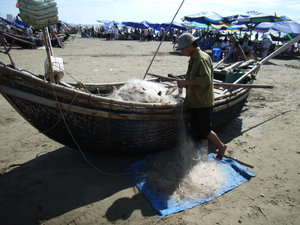 A fisherman at Sầm Sơn beach (north VN)