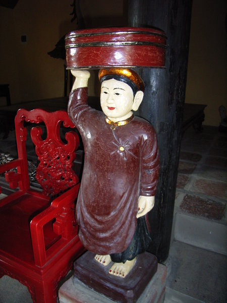 A statue inside Long Đình theater