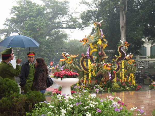 Policemen and dragon-shaped flowers
