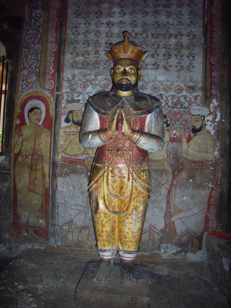 Statue of King inside a cave