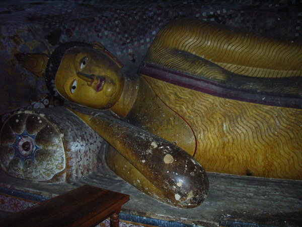 Lying Buddha statue inside the Cave Temple