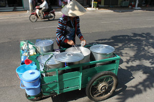 Selling puddings on a street in Phan Thiết city