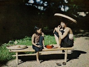 Eating betel for red lips & black teeth (1921)