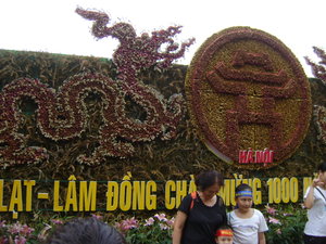 Model of dragon & symbol of Hanoi made from flowers