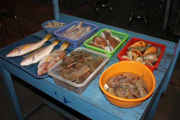 Seafood on sale at Dinh Cậu night market