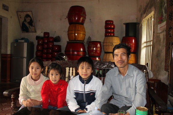 Famous artist Mr. Khang and his grandchildren