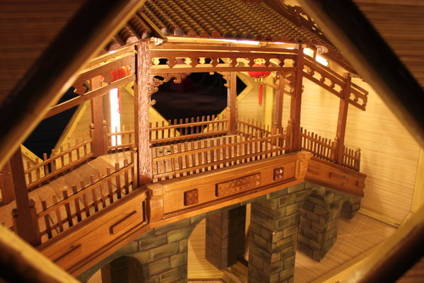 Model of Japanese bridge inside a lantern