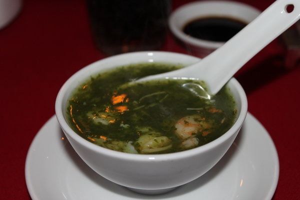Spinach soup with seafood and conpoy