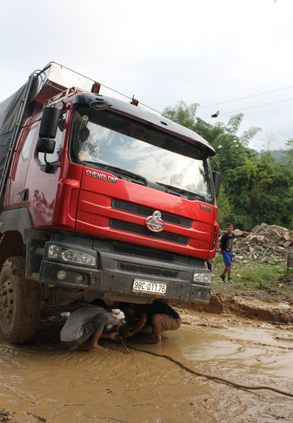 Inclining truck on the muddy road