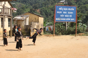 H'mong children are playing "Đánh cù" game