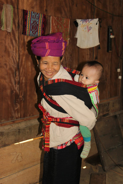 A Thai ethnic woman & her grandson