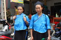 Two Nùng ethnic girls at the Sunday market